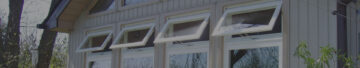 Top-hinged awning windows on a building exterior