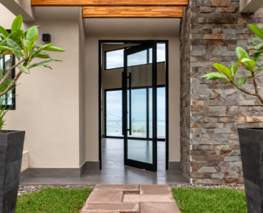 Black aluminium glass pivot entrance door